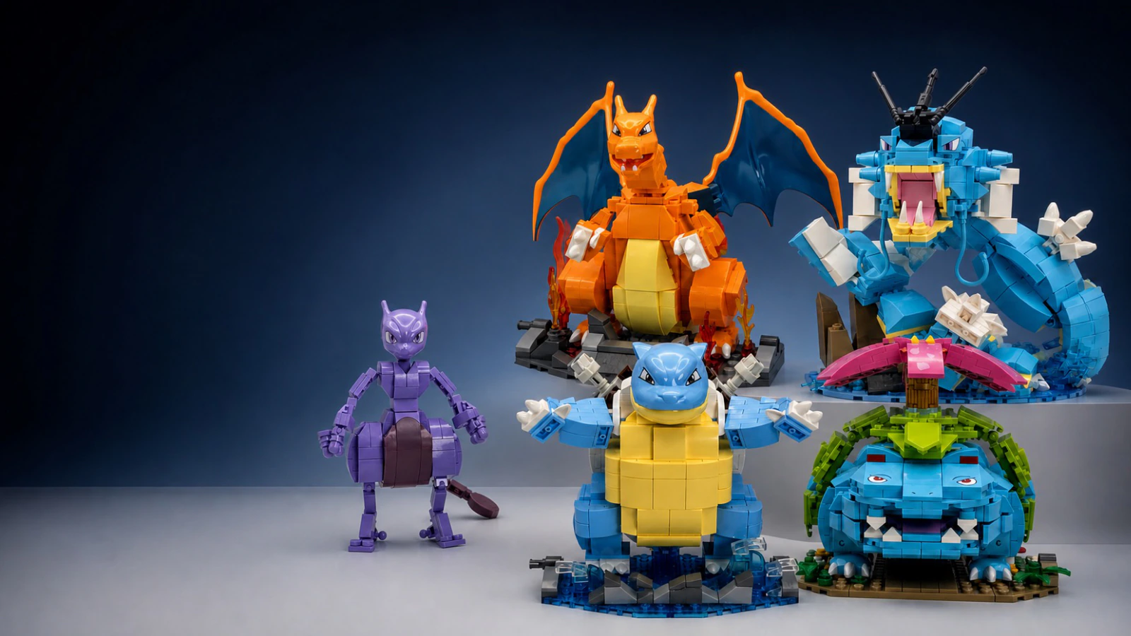 Five brick-built character models featuring Mewtwo, Blastoise, Venusaur, Charizard and Gyarados.